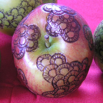 Angela Read Art, Tattoed Apple, a repeated pattern drawn onto an apple in biro